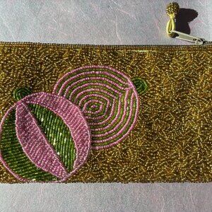 Beaded clutch with holiday ornament design by Shiraleah. New